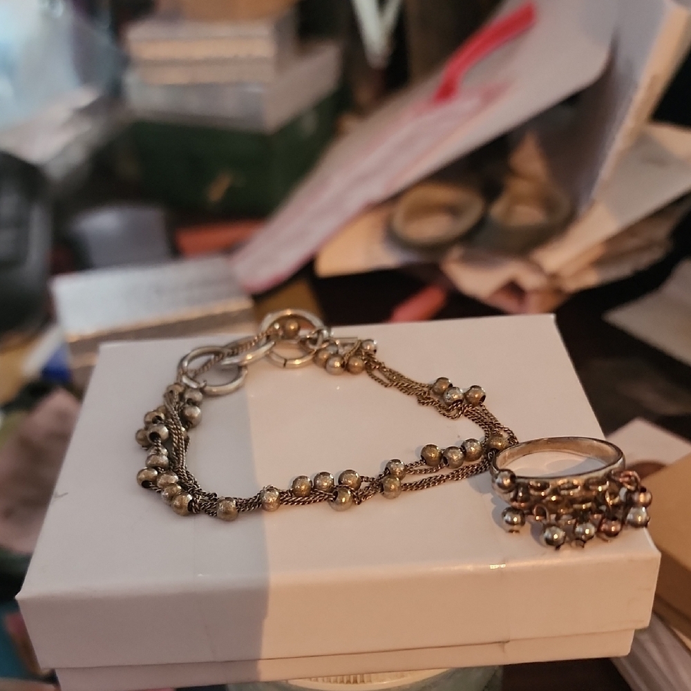 Elegant Gold Bracelet with Silver Accents